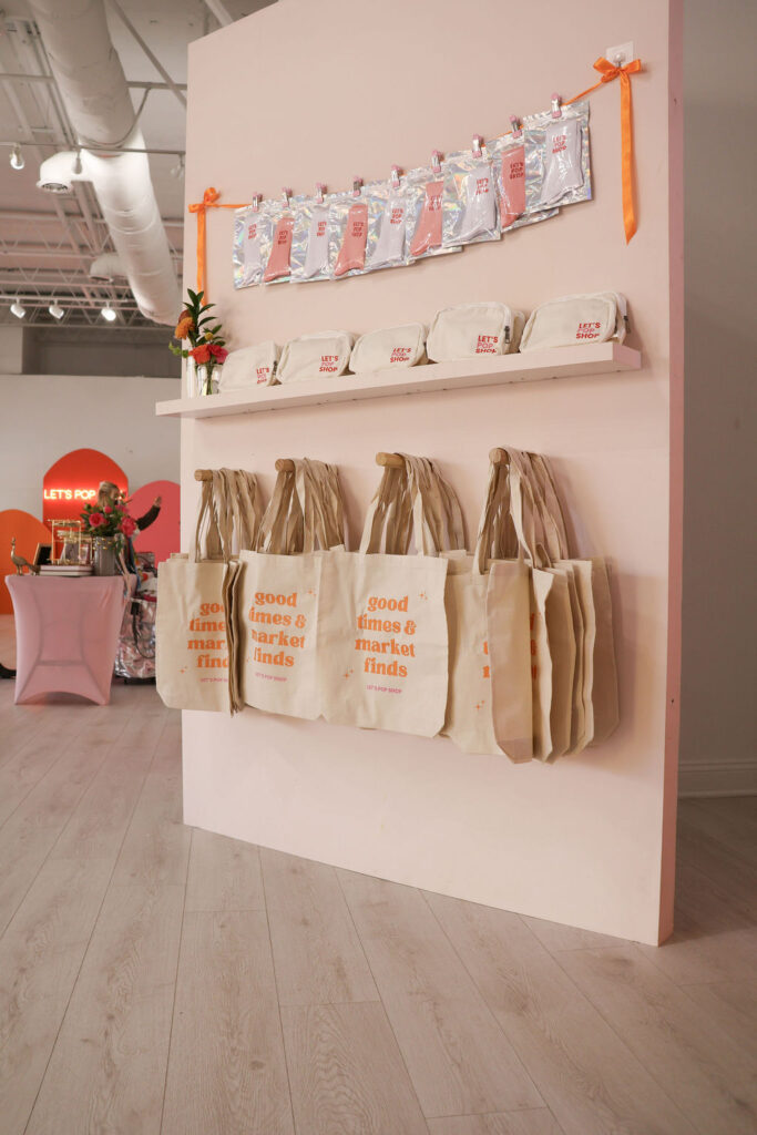 Vendor displays and branded signage in the backdrop