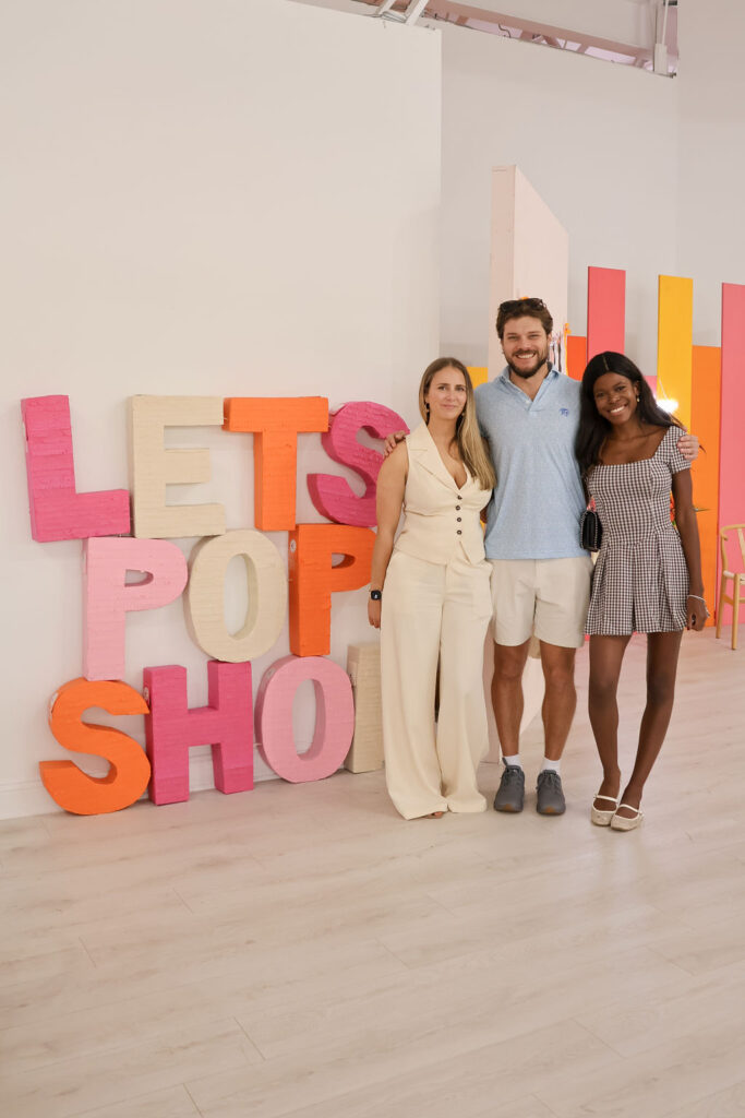 Shoppers enjoy photo oppurtinites with branded signs